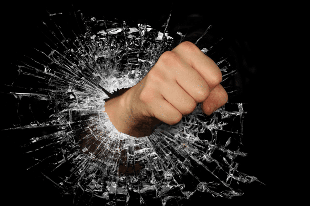 Illustration of a fist breaking through shattered glass, symbolizing intentional property damage.